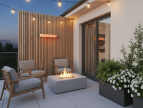 AussieSteel wall-mounted outdoor patio heater OEM series in a compact terrace seating area, combining radiant outdoor heating with modern balcony and hospitality space applications.