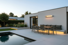 AussieSteel wall-mounted outdoor patio heater OEM series installed beside a poolside dining area, supporting custom radiant heating for patios, terraces, and modern outdoor residential projects.