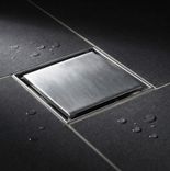 Brushed stainless steel tile-in floor drain with removable cover, tight-tolerance frame and clean edge detailing