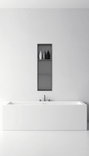 Minimalist vertical shower niche OEM series above a freestanding bathtub, presenting recessed wall storage, clean geometric lines, and custom stainless steel niche solutions for modern bathroom design.